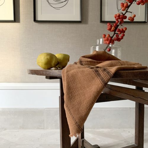 Trapo de cocina color naranja.