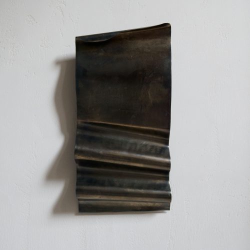 Escultura de pared abstracta acabado bronce